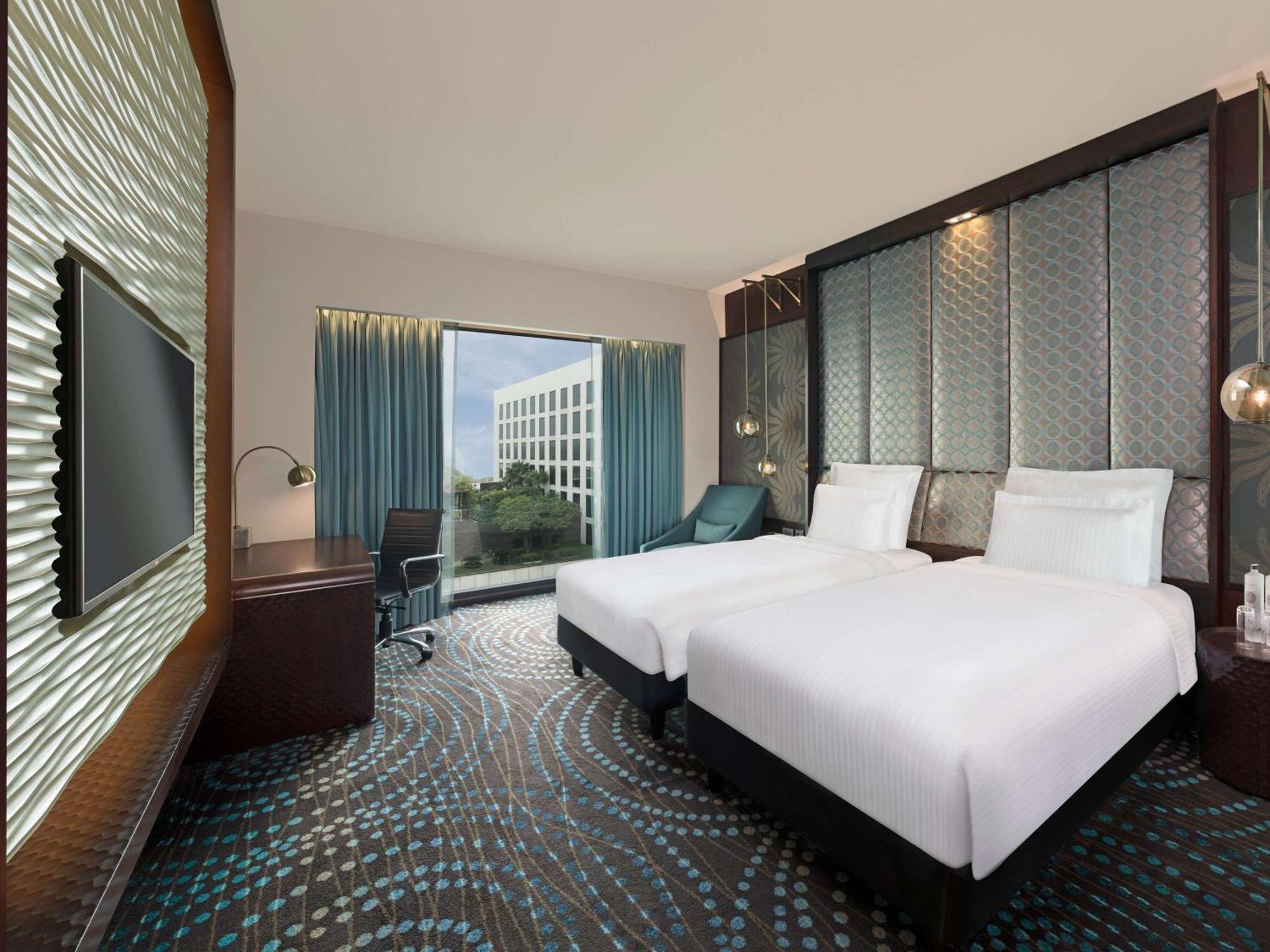 Pullman New Delhi Aerocity Exterior foto Deluxe Room