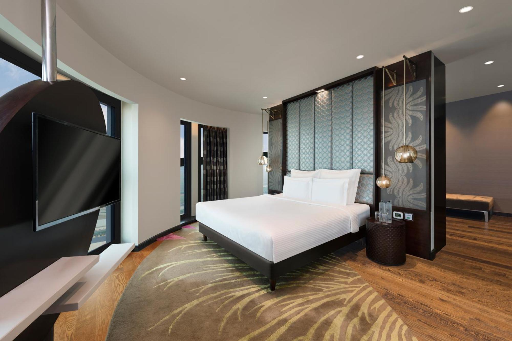 Pullman New Delhi Aerocity Exterior foto Suite bedroom