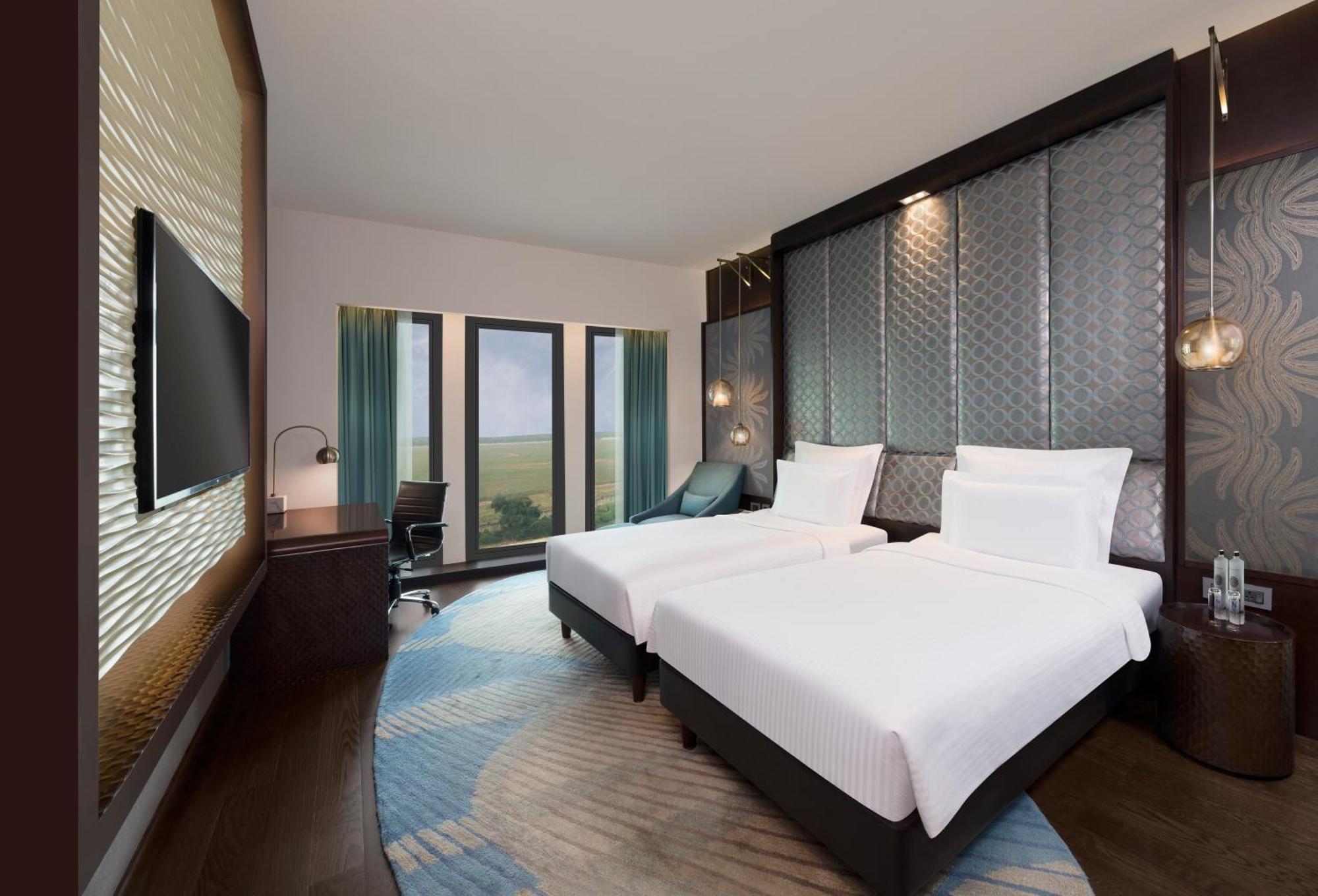 Pullman New Delhi Aerocity Exterior foto Deluxe Room